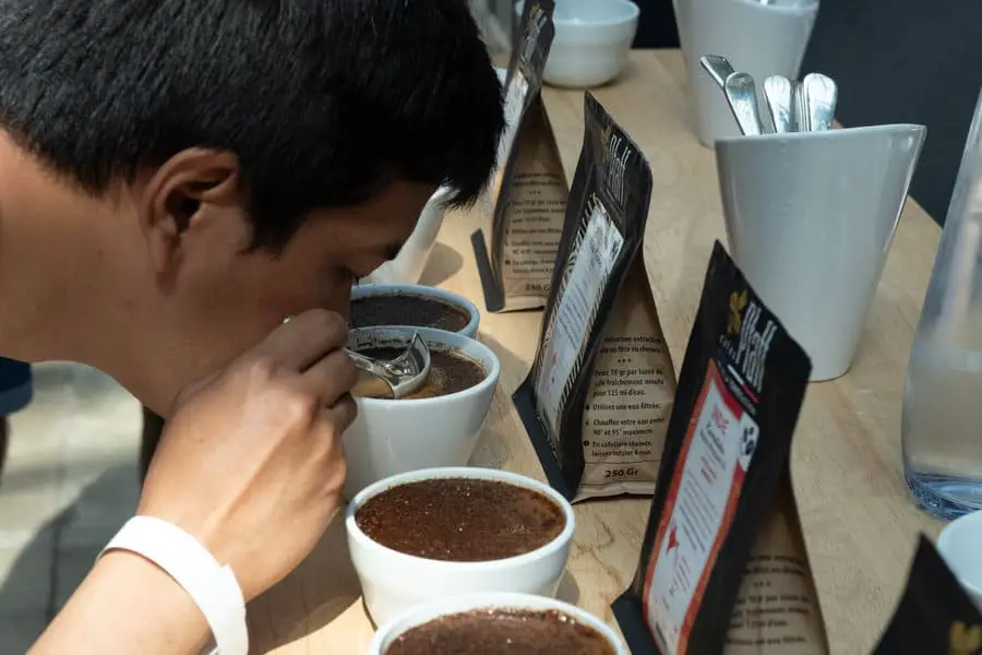 Breaking the Crust at a Coffee Cupping