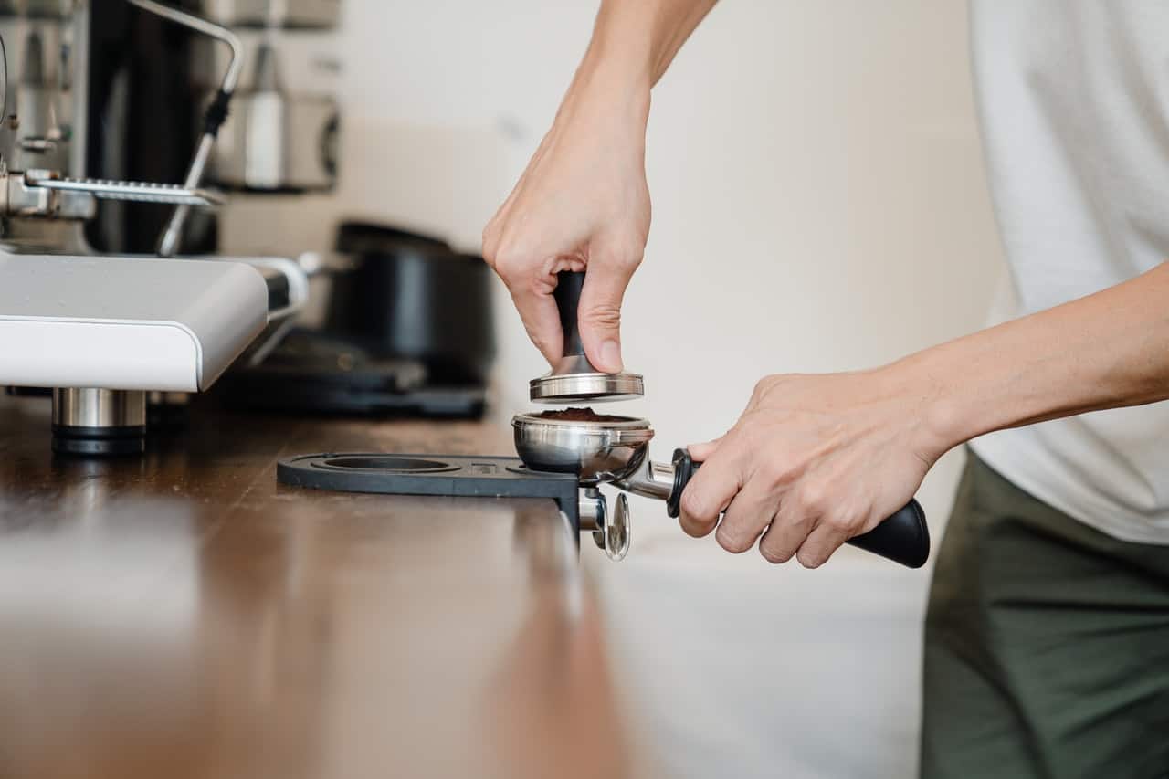 Tamping espresso in a portafilter